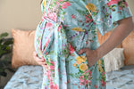 Robe swaddle personalized hat with matching dad shirt in blue and pink floral