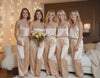 Bridal party wearing matching champagne satin cami pajama sets, perfect for bride pajamas, bridesmaid pajamas, getting ready outfits, and bridal party photos. Elegant bridal loungewear ideal for weddings, bachelorette parties, and morning-of celebrations. Soft silky pajamas with drawstring pants, great for gifting and comfortable pre-wedding moments.