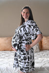 Robe swaddle personalized hat with matching dad shirt.