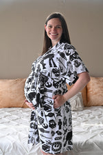 Robe swaddle personalized hat with matching dad shirt.
